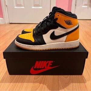 Nike Air Jordan 1 Black and Yellow Taxi High-Top Sneakers